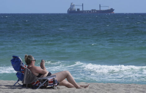 Tar balls wash ashore on Florida beaches, but the source of the sticky black goo is a mystery